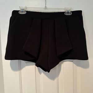 Black dress shorts with front flap details